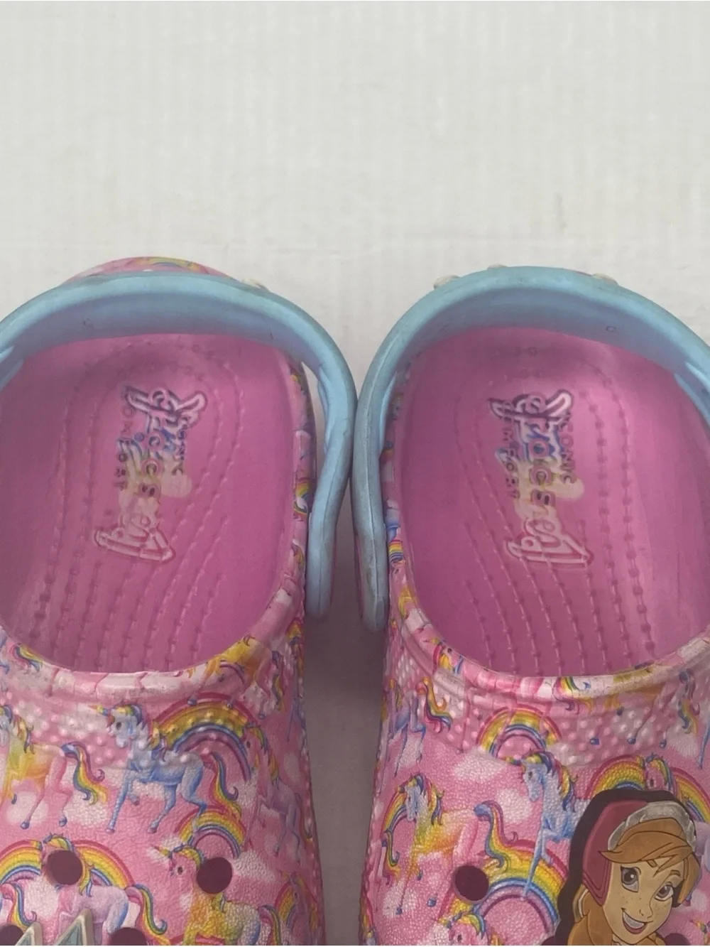 CROCS Pink Rainbow Print Clogs with Blue Heel Strap